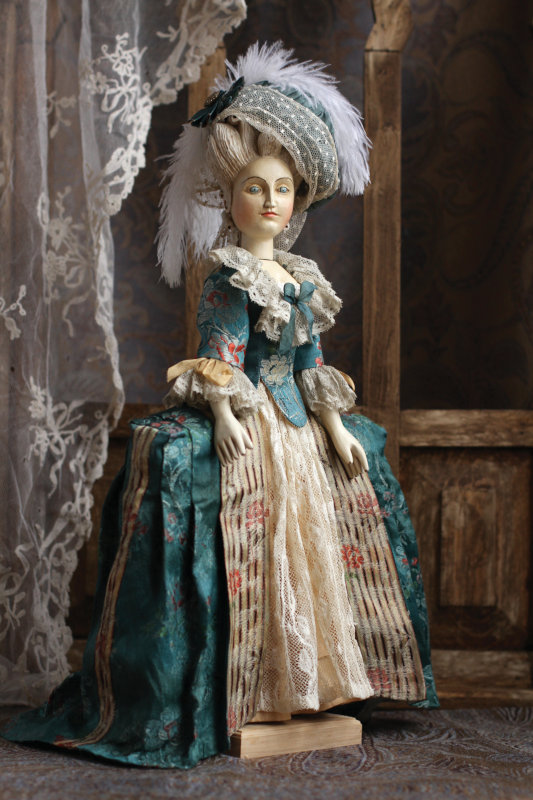A 14-inch wooden doll dressed in French Court style by Mordvinkova.