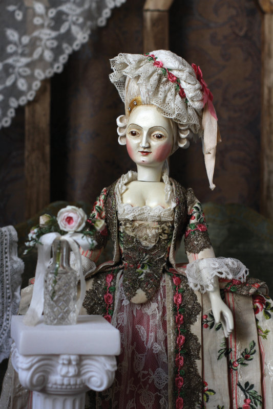 A 14-inch wooden doll dressed in French Court style by Mordvinkova.