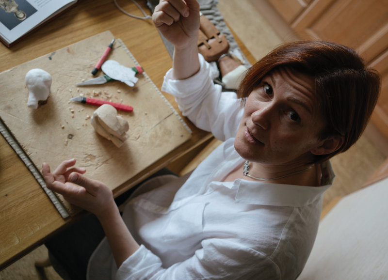 Mordvinkova works on her dolls.